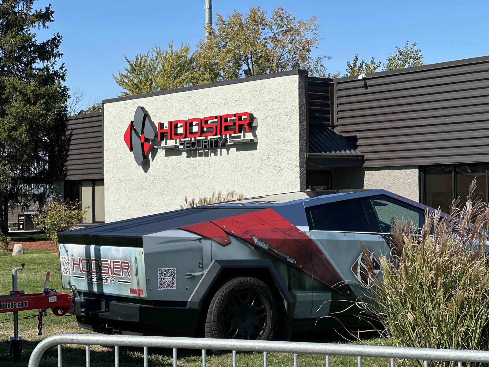 Local security provider | Image of Hoosier Security's new office building with Cyber Truck parked in front.